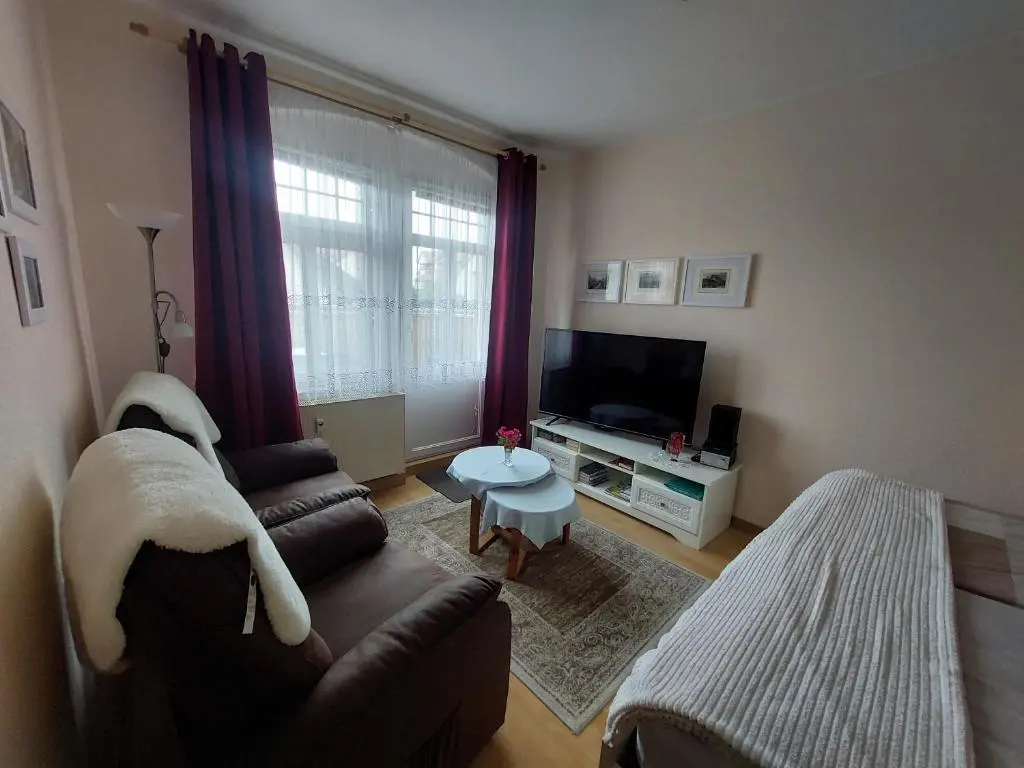 Wohnzimmer der Ferienwohnung Gartenblick I